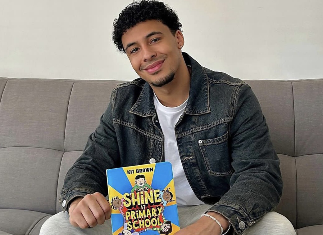 Kit Brown with book