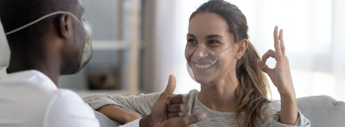 People happily wearing the innovative face masks