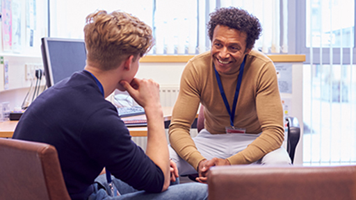 A student and teacher in conversation