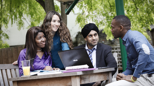 Group of men and women talking